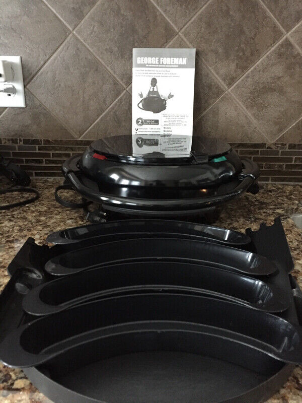 REDUCED-Like New George Foreman with 2 removable plates in Kitchen & Dining Wares in Saskatoon