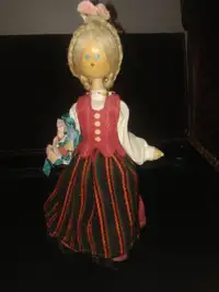 Wooden farm girl doll