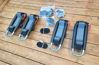 Selling two sets of very lightly used Yakima Jaylow kayak J-racks with straps, universal mounts. See...