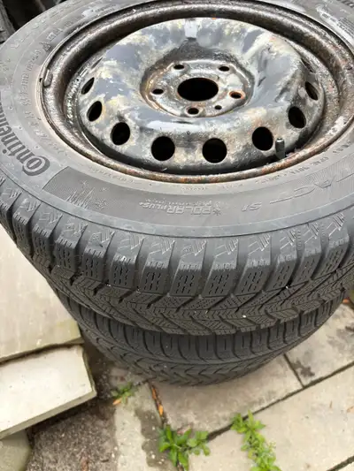 I'm selling a set of four Continental Winter Contact winter tires mounted on steel rims, size 195/65...