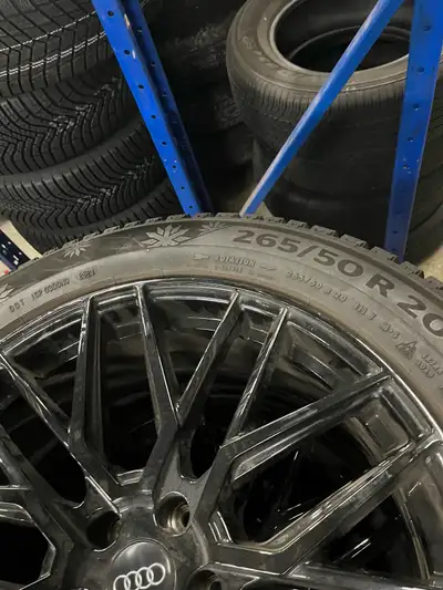 Tire size is 265/50R20 with black glossy audi rims Tires have 3 peak snowflake symbol which meets pe...