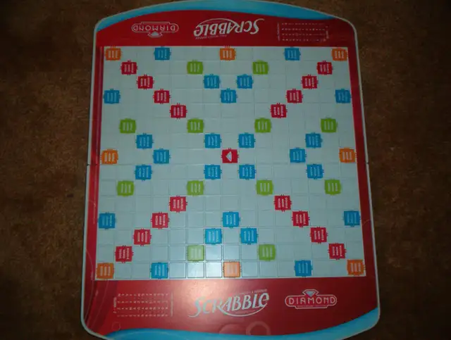 Diamond Anniversary Edition Scrabble Rotating Board Game Unplaye in Toys & Games in Calgary - Image 3