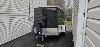 I am selling 2023, 8ft by 5ft V nose cargo trailer, perfect for hauling equipment or motorcycle tran...
