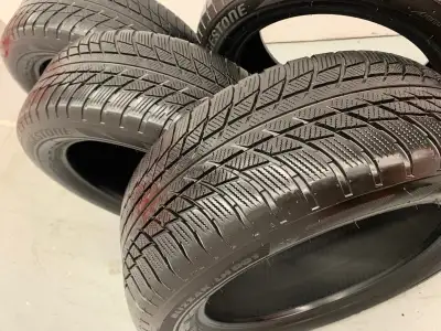 set of four Bridgestone Blizzak LM001 tires available. They are high profile RSC Run Flat (RFT) tire...