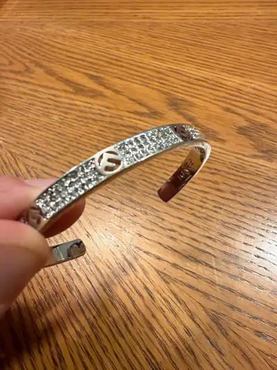 Ladies bracelets for sale Fendi iced out bracelet silver $20 Cartier gold bracelet $15 Silver tennis...