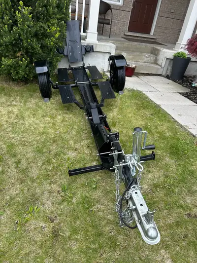 This Stinger Trailer is perfect for safely and easily towing your motorcycle. This trailer is in use...