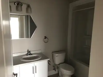 Very large one bedroom accessible unit in a modern building. Ground floor deck into a yard