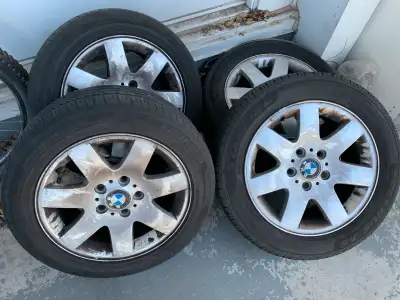 I am selling a set of 16" BMW rims with tires. These rims and tires are used but still have some lif...