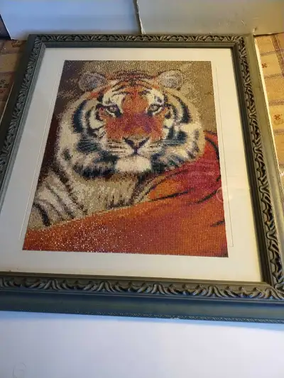 Great tiger picture made from wee tiles. Size is 19.50 inches by 22.50 inches. Breathtaking picture....
