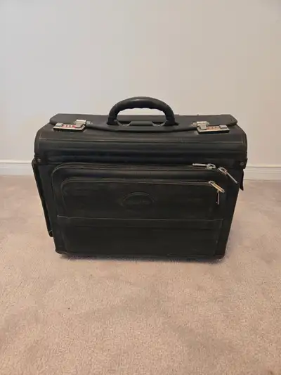 Large heavy-duty document briefcase on wheels, with extendable handle. Has space for a notebook/lapt...