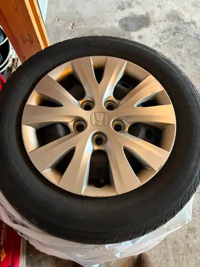 Hello, I am selling this all Season Honda Civic Tires with Rims P195/65R15 89H Firestone as what you...