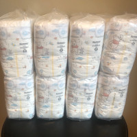 4 Sealed Bags of Huggies Size 2 Diapers