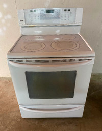 KENMORE GLASS TOP STOVE $280. FREE DELIVERY. 403 389 8241.