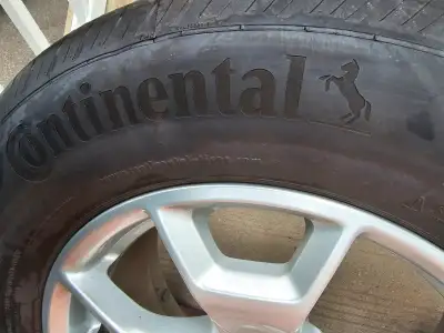 225/65R17 ALL SEASON CONTINENTAL BRAND USED TIRES WITH ORIGINAL RIMS FROM LOCAL FORD CAR DEALER. AVA...