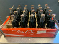Coca Cola box and bottles 