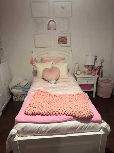 White trundle wooden twin beds by Cafe Kid. Comes apart for easy transportation. Mattresses not incl...