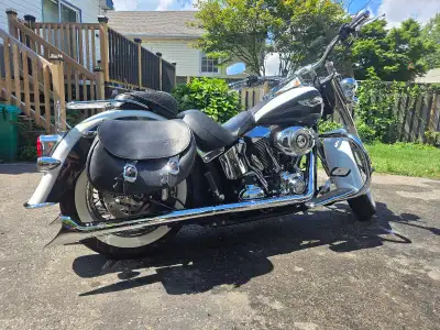2008 harley davidson softail deluxe 76398km, being sold as is -lowered -reach seat -heated grips -va...