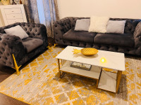 Sofas , carpet , coffee table and cushions 