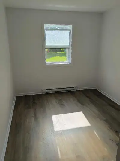 Bright minimalist room in Dartmouth North apartment, available August 1st. The space features clean...