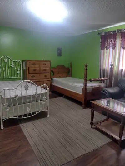 Very spacious and bright room on main floor walking distance from Georgian college Barrie available...
