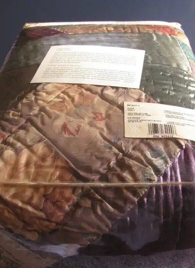 This multi-color, patchwork, quilt is an estate find...purchased from Sears in 2006. Its never been...