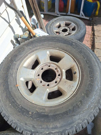 Rim and tires off a dodge 2500