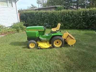 Selling my John deer 300, fresh repaint been completely gone through its got a 46 inch tiller, 48inc...