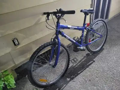 Get ready to hit the trails with this Supercycle mountain bike! This rugged bike is perfect for off-...