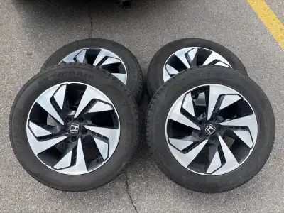 Selling a full set of 4 OEM Honda CR-V Touring alloy rims with tires mounted and balanced. Came off...