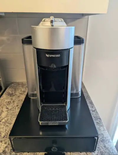 Selling a mint condition De'Longhi Nespresso Vertuo Coffee and Espresso Machine with storage stand I...
