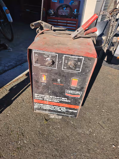 Century battery charger with boost 12 volt .. $125.00 call or text Andy 403 669 4466 in parksville b...