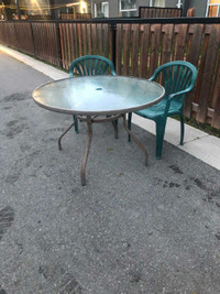 44 in glass top patio table " price negotiable *