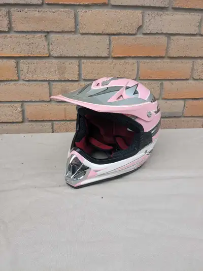 Kids/youth motocross helmet in a sharp pink, white, and grey design. Perfect for dirt biking, ATV ri...