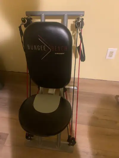 Get ready to bounce your way to fitness with this Weider Bungee Bench! This innovative workout bench...