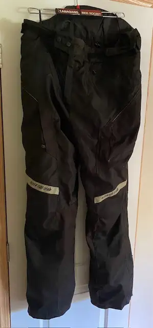 The ALTER EGO 12.0 black pants are T/2XL. with knee protectors and sure fit waist adjusters. 34" ins...
