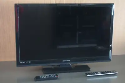 Model LF320EM4 full HD LED TV. Has 3 HDMI, 1 component, 1 USB, 1 VGA inputs. Antenna with digital re...