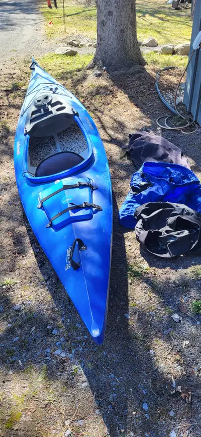 Great, stable Canadian Kayak. Large cockpit with skid stop, aft water tight compartment. Comes with...