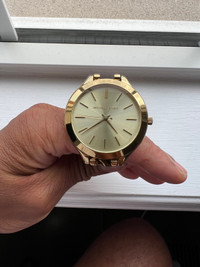 Used gold Michael Kors watch female