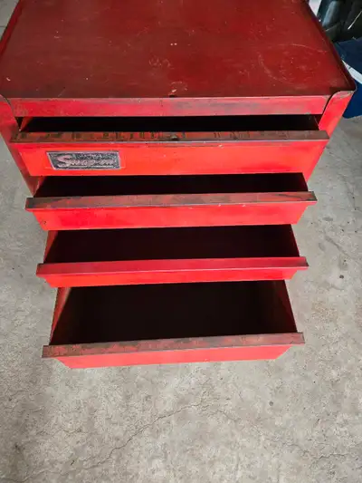 Vintage snap on four drawer original wheels in good condition model # shown in images, plus two orig...
