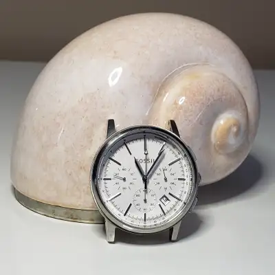 Silver Fossil Watch - $50 Step out in style with this chronograph. - Analogue dial that displays dat...