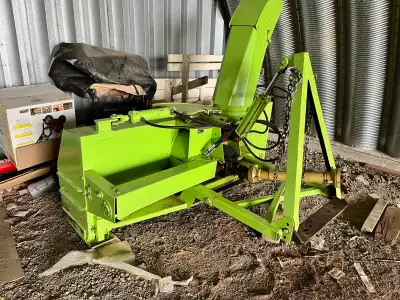 1996 Schulte dual stage Snowblower. 96" clearing path. Hydraulic lift and discharge chute. Modified...