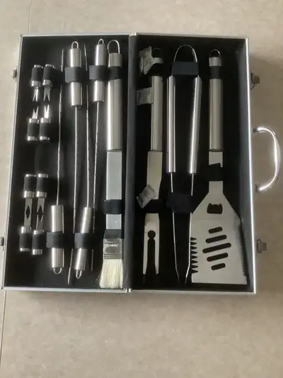 Stainless steel grilling set Includes slotted spatula and bottle opener, tong, fork, basting brush,...