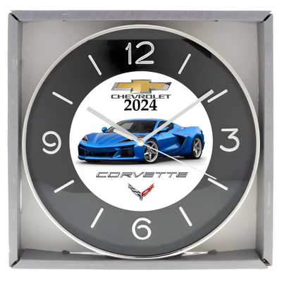 Brand new boxed wall clock approximately 10 inches in diameter featuring Custom designed artwork. Cl...