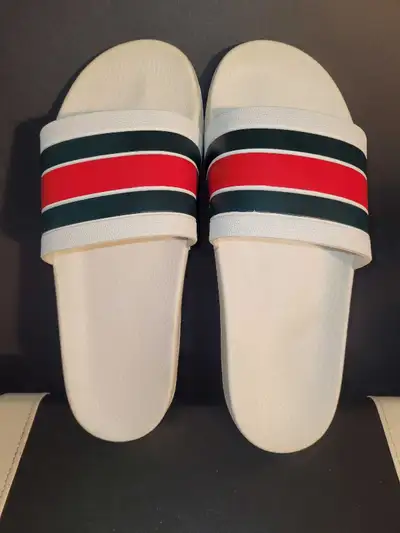 Just reduced from $80. Gucci White Rubber Pursuit 72 Pool Slides Size 11. As shown in photos .New De...