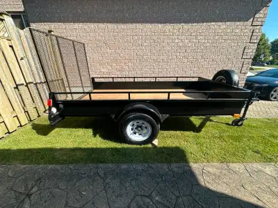 5 x 10 Utility trailer with owner ship. Excellent condition 3500 lbs axle Spare tire and tongue jack...