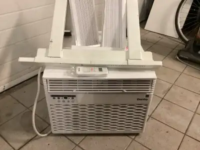 Danby window air conditioner, 12,000 BTU with remote, window skirts and heavy duty window support. L...