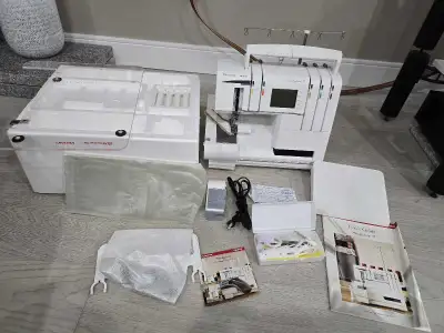 It is like new condition, working great and has been serviced by the Triangle Sewing center in Guelp...