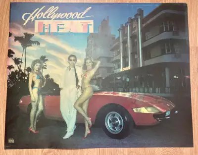 This is a used Gottlieb Hollywood Heat translite. There is water markings and a few scratches. Locat...