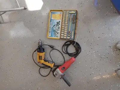 Angle grinder, hammer drill and socket set, View more