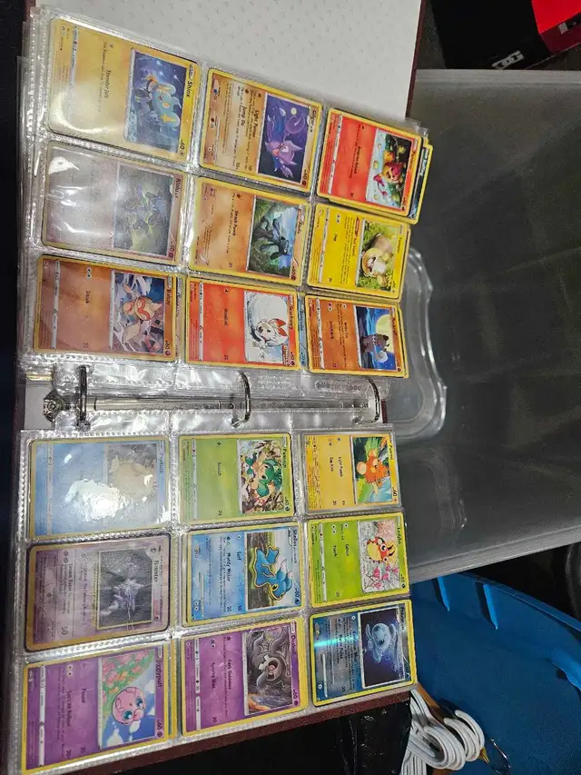 Pokémon cards in binder